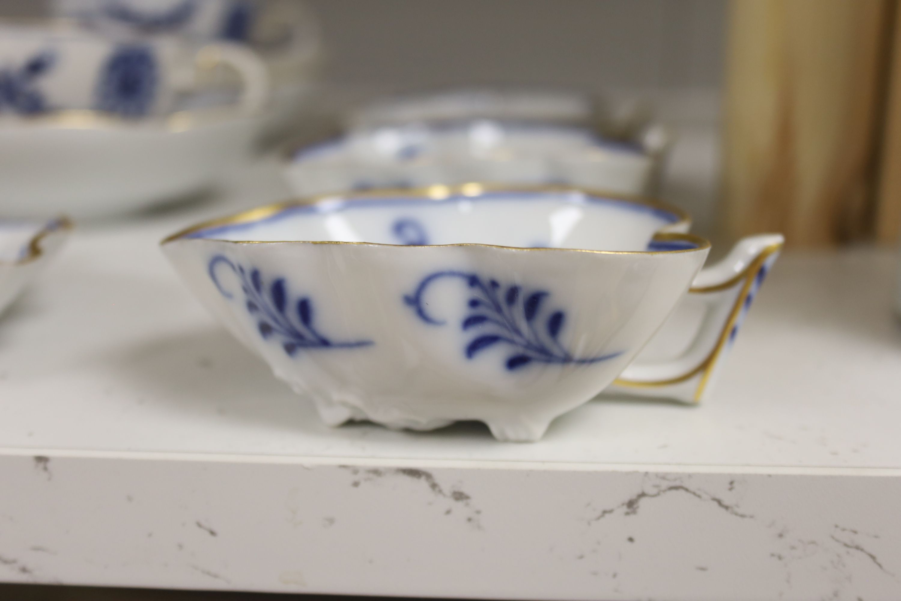 A Meissen blue and white part coffee service and similar leaf shaped dishes